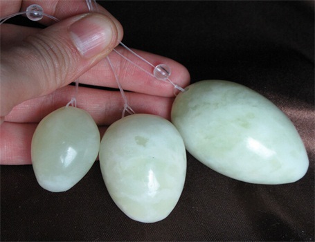 Egg-shaped jade stone massage stick for body massage